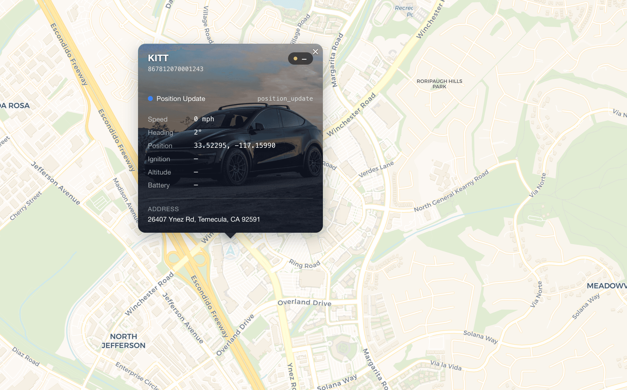 Nexara tracker showing a live position update for a vehicle — speed, heading, coordinates and address